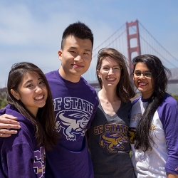 SF State students standing in front of Golden Gate Bridge
